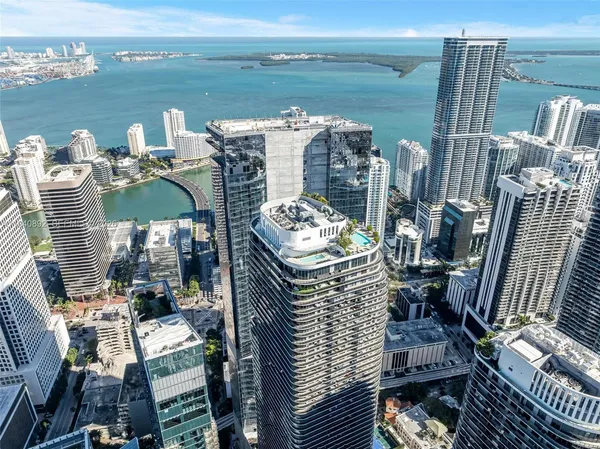 a terrace with outdoor seating and city view