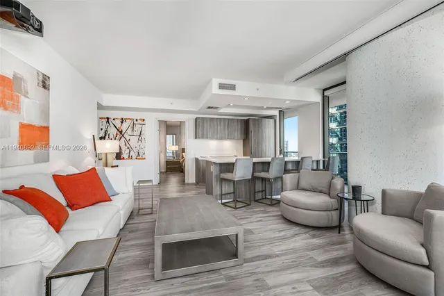 a living room with furniture and a couch