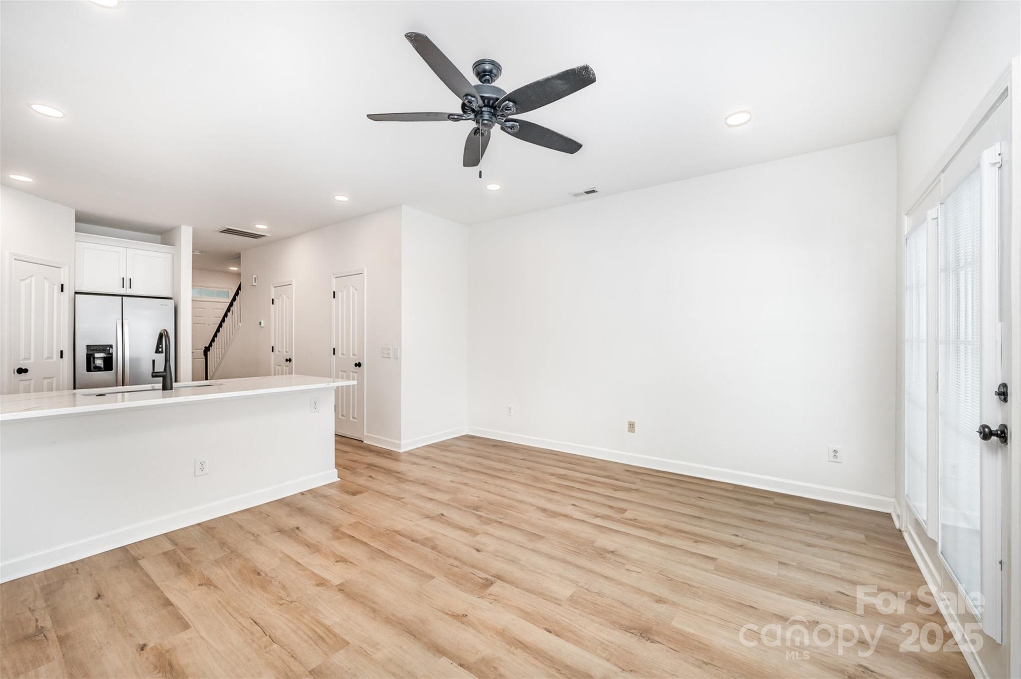 1135 Market Street Fort Mill, SC 29708 - Photo 12 of 36 wooden floor in an empty room with a window
