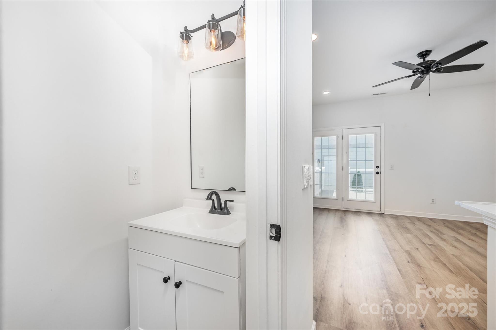 1135 Market Street Fort Mill, SC 29708 - Photo 15 of 36 a bathroom with a sink and a mirror
