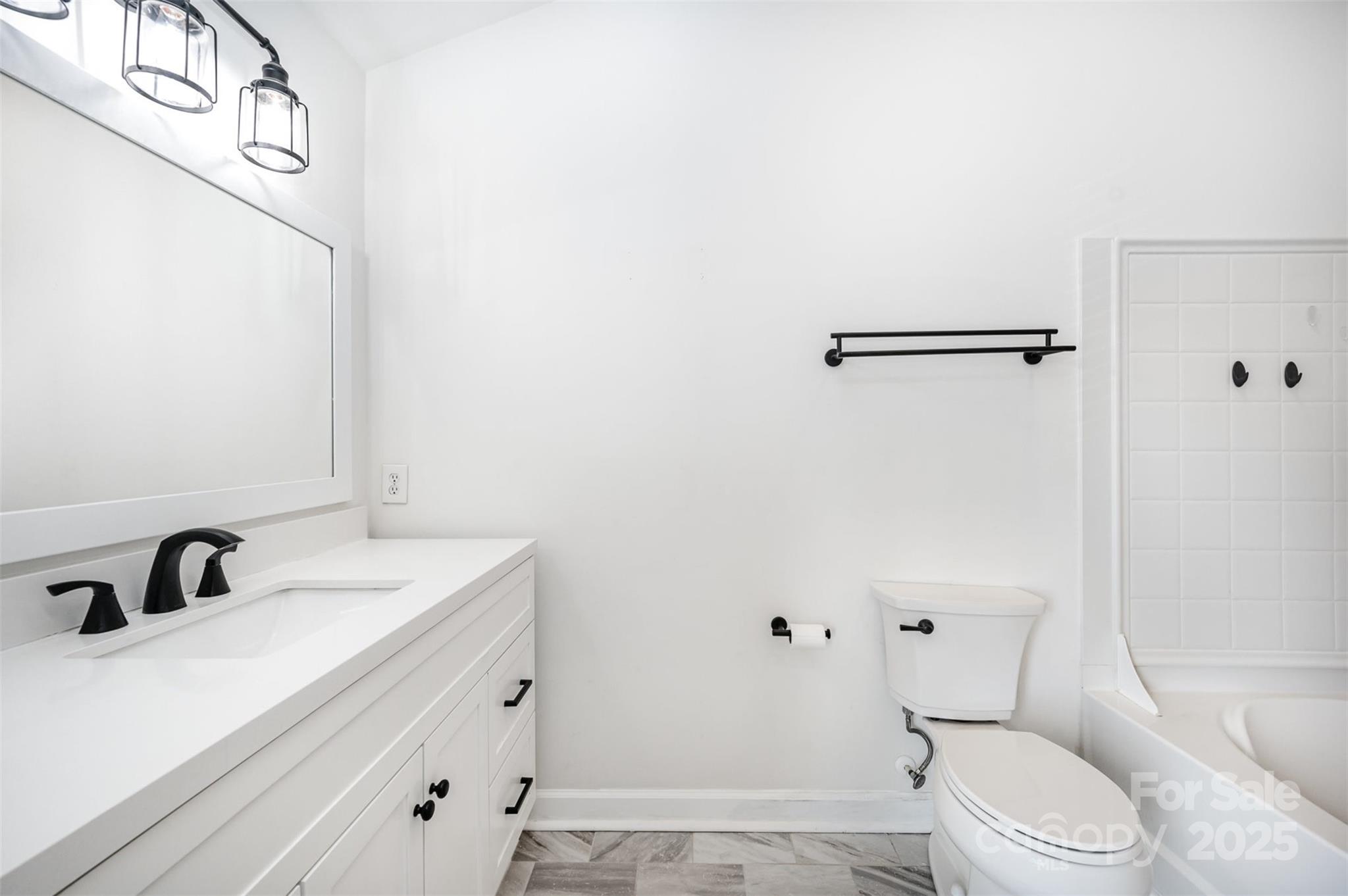 1135 Market Street Fort Mill, SC 29708 - Photo 19 of 36 a bathroom with a sink a toilet and shower