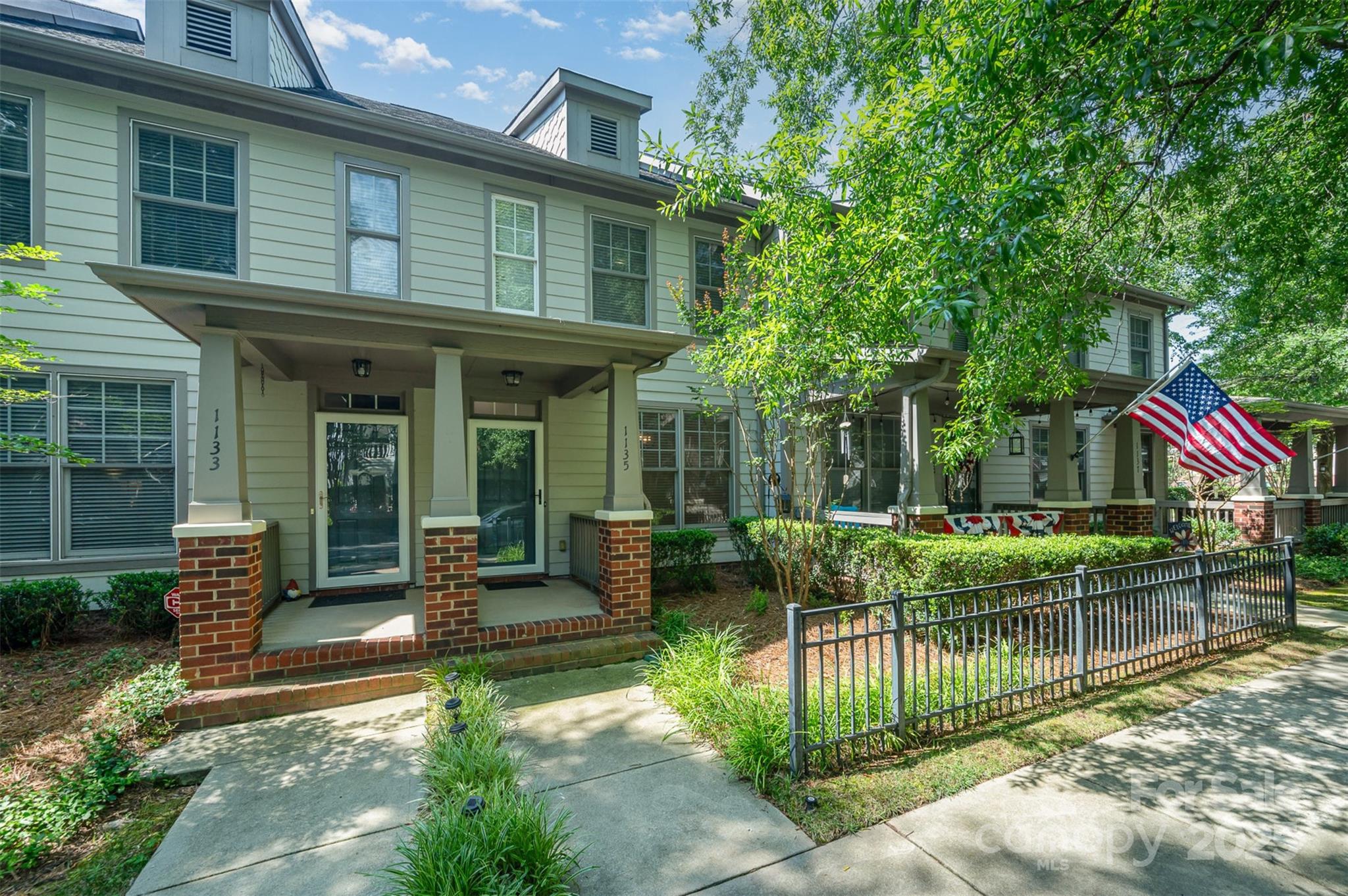 1135 Market Street Fort Mill, SC 29708 - Photo 2 of 36 a view of house with a backyard and patio