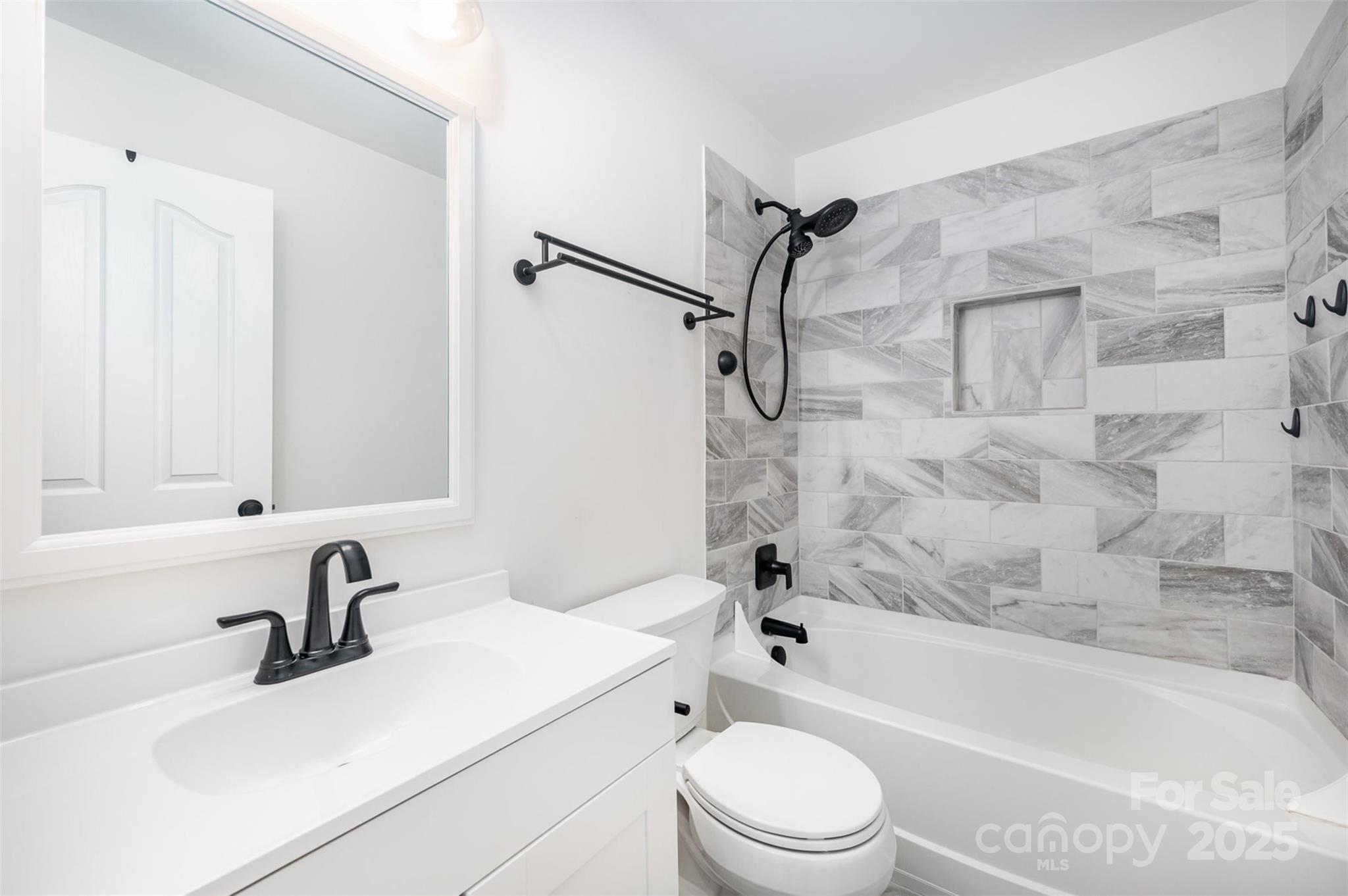1135 Market Street Fort Mill, SC 29708 - Photo 24 of 36 a bathroom with a sink toilet and a bathtub