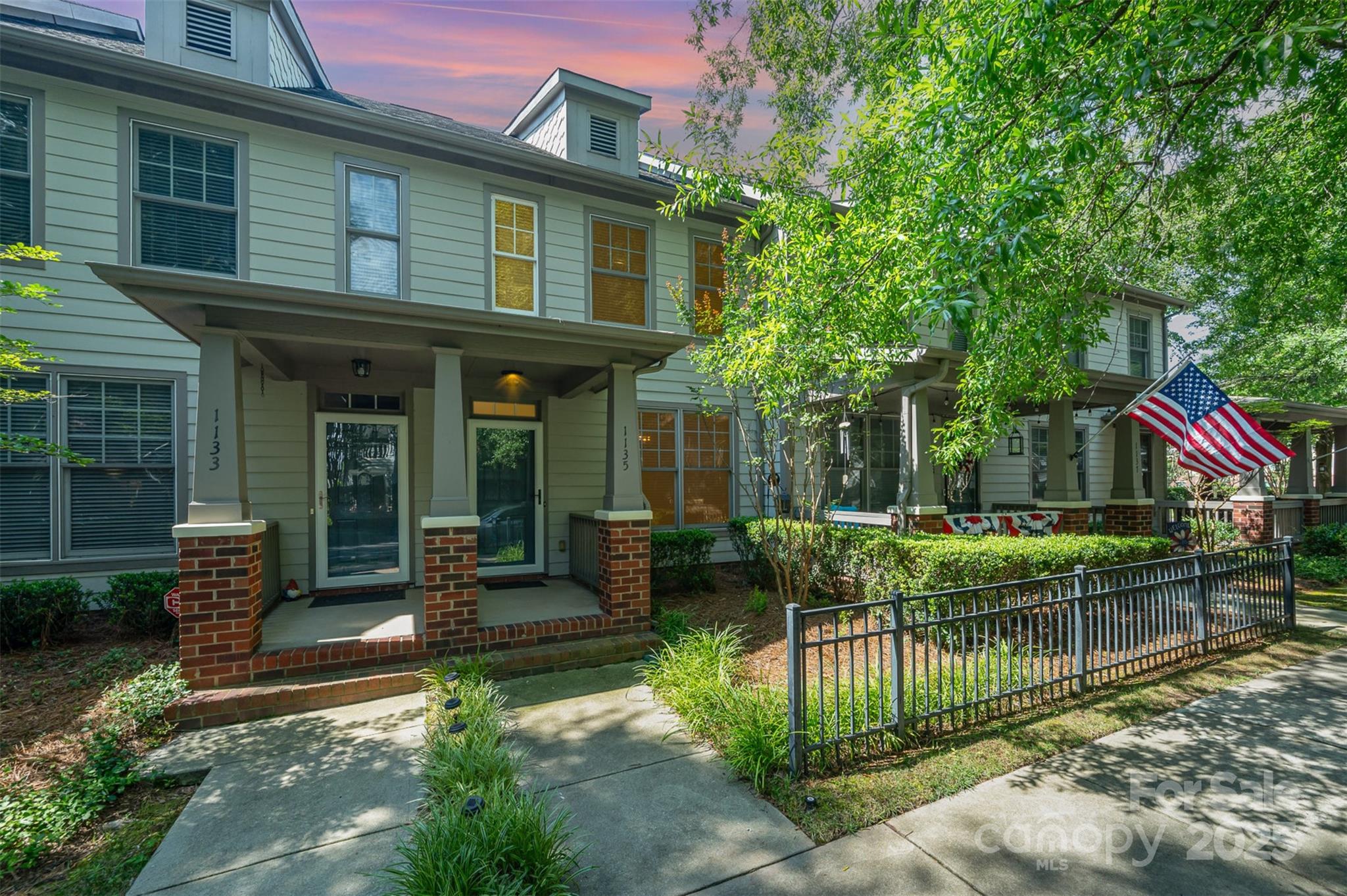 1135 Market Street Fort Mill, SC 29708 - Photo 5 of 36 a view of house with a chairs and table in a patio