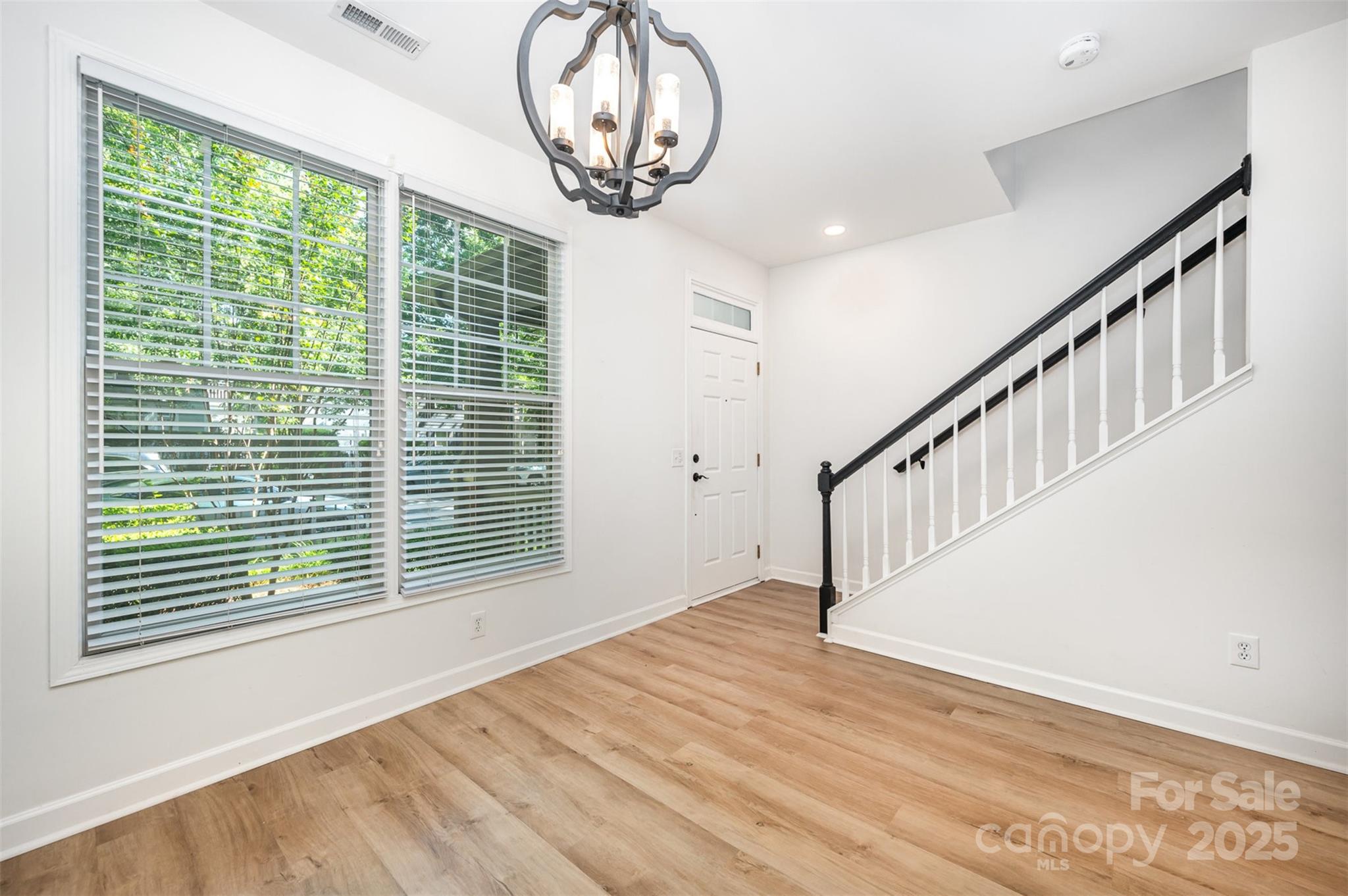 1135 Market Street Fort Mill, SC 29708 - Photo 6 of 36 a view of an entryway with wooden floor
