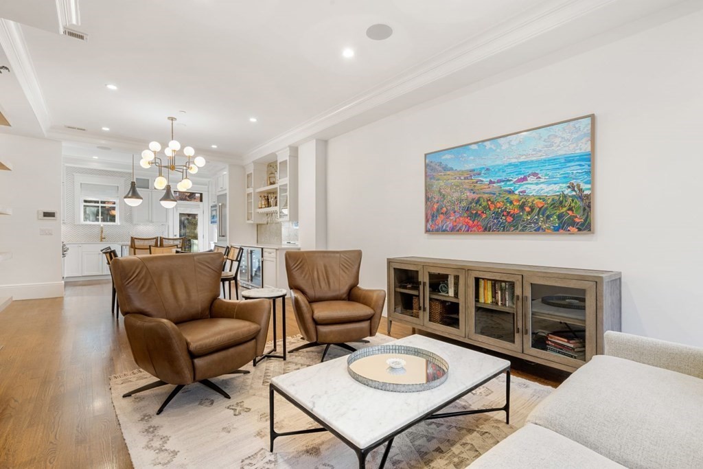 34 Dwight Street, Unit 1 Boston, MA 02118 - Photo 17 of 40 a living room with furniture and a fireplace