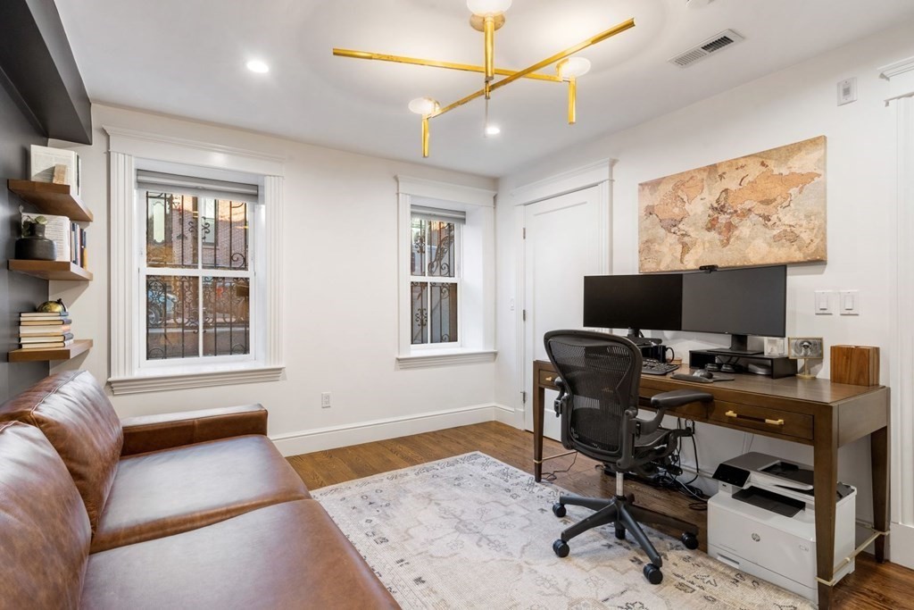 34 Dwight Street, Unit 1 Boston, MA 02118 - Photo 24 of 40 a view of a livingroom with workspace and a window