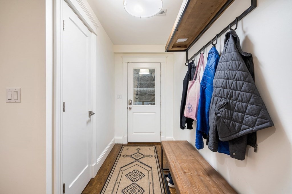 34 Dwight Street, Unit 1 Boston, MA 02118 - Photo 38 of 40 a view of walk in closet with clothes and shoes