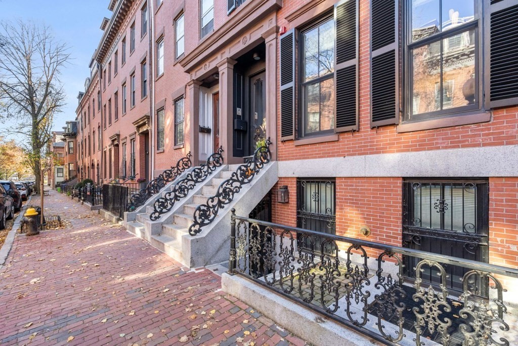 34 Dwight Street, Unit 1 Boston, MA 02118 - Photo 5 of 40 a view of an buildings with wooden stairs