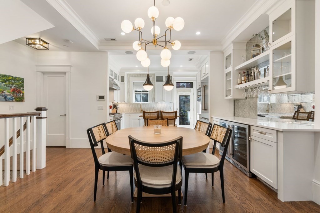 34 Dwight Street, Unit 1 Boston, MA 02118 - Photo 10 of 40 a view of a dining room with furniture and wooden floor