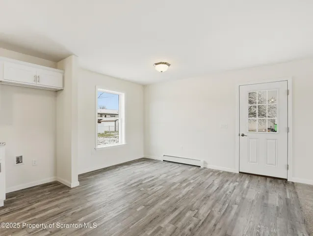 a view of a hallway with entryway