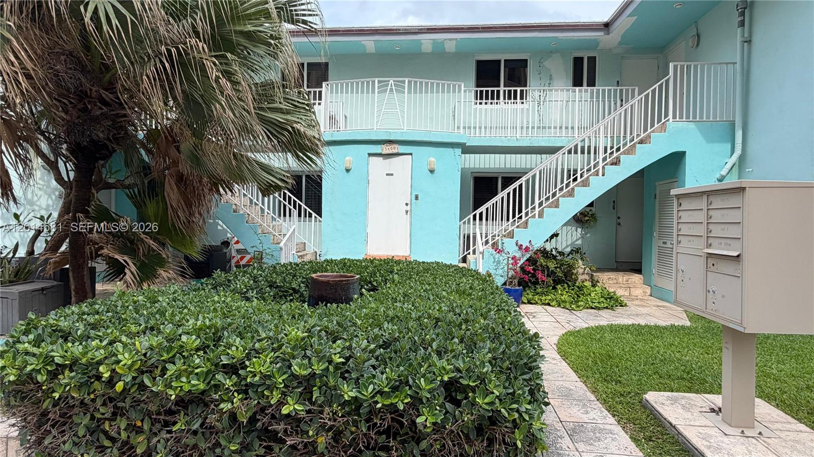 3400 North Surf Road, Unit 1 Hollywood, FL 33019 - Photo 1 of 14 a front view of a house with a yard