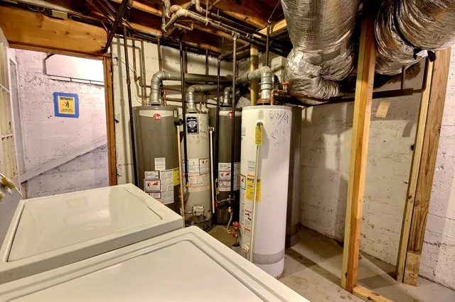 a bathroom with a tub and shower