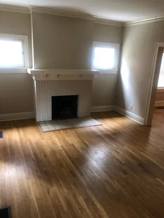 a kitchen with stainless steel appliances a sink and cabinets