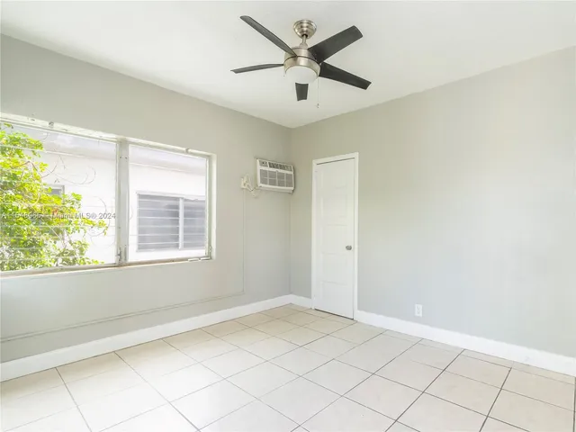 a bathroom with a sink a toilet and a bathtub
