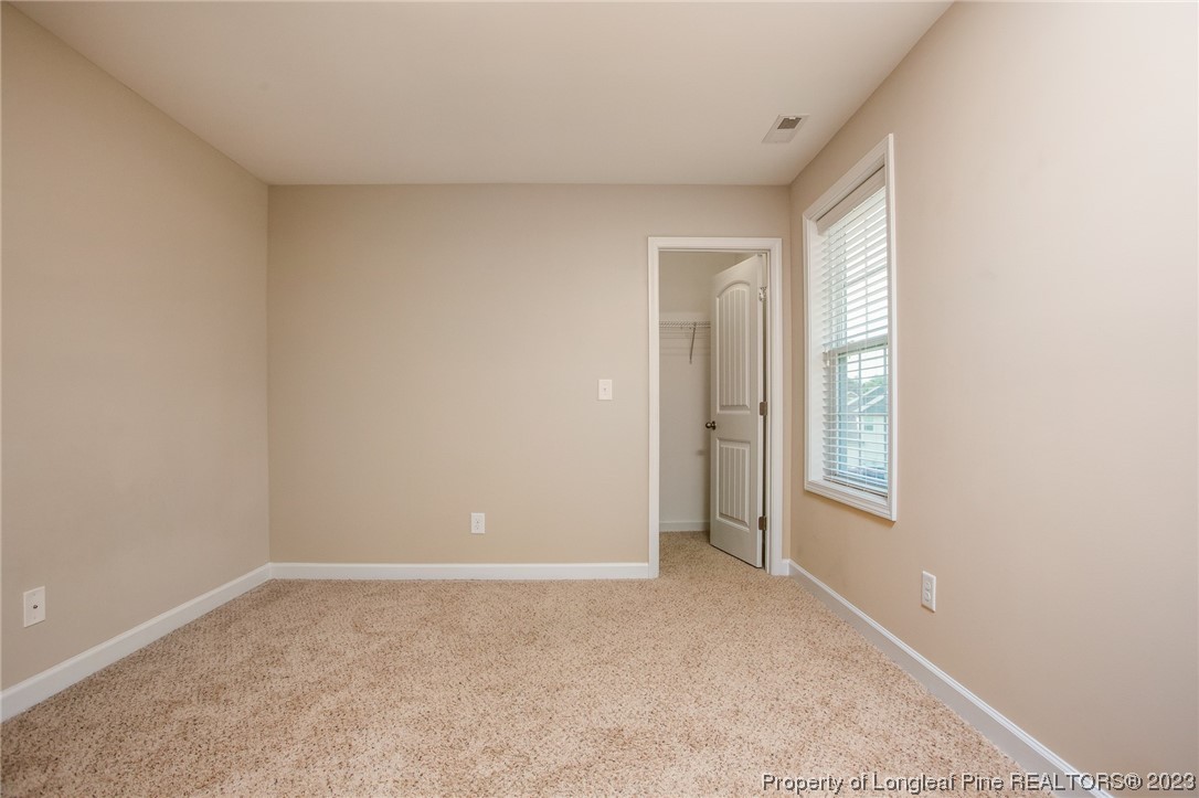 157 Shellbark Drive Spring Lake, NC 28390 - Photo 16 of 28 a view of an empty room with a window