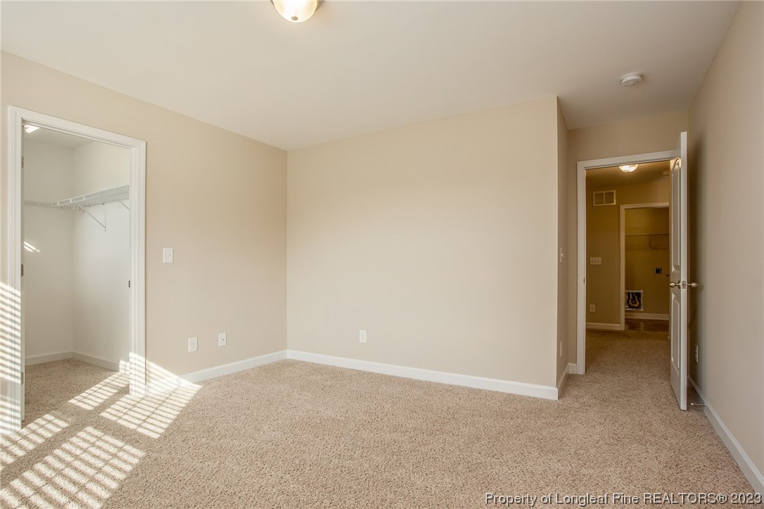 157 Shellbark Drive Spring Lake, NC 28390 - Photo 21 of 28 an empty room with a bathroom and a sink