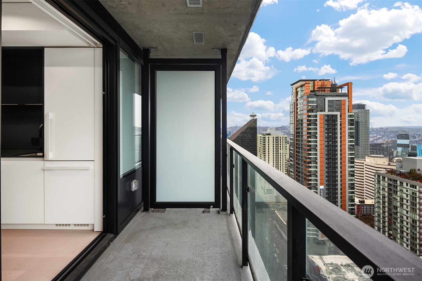 300 Virginia Street, Unit 3103 Seattle, WA 98101 - Photo 13 of 36 a balcony with view of city