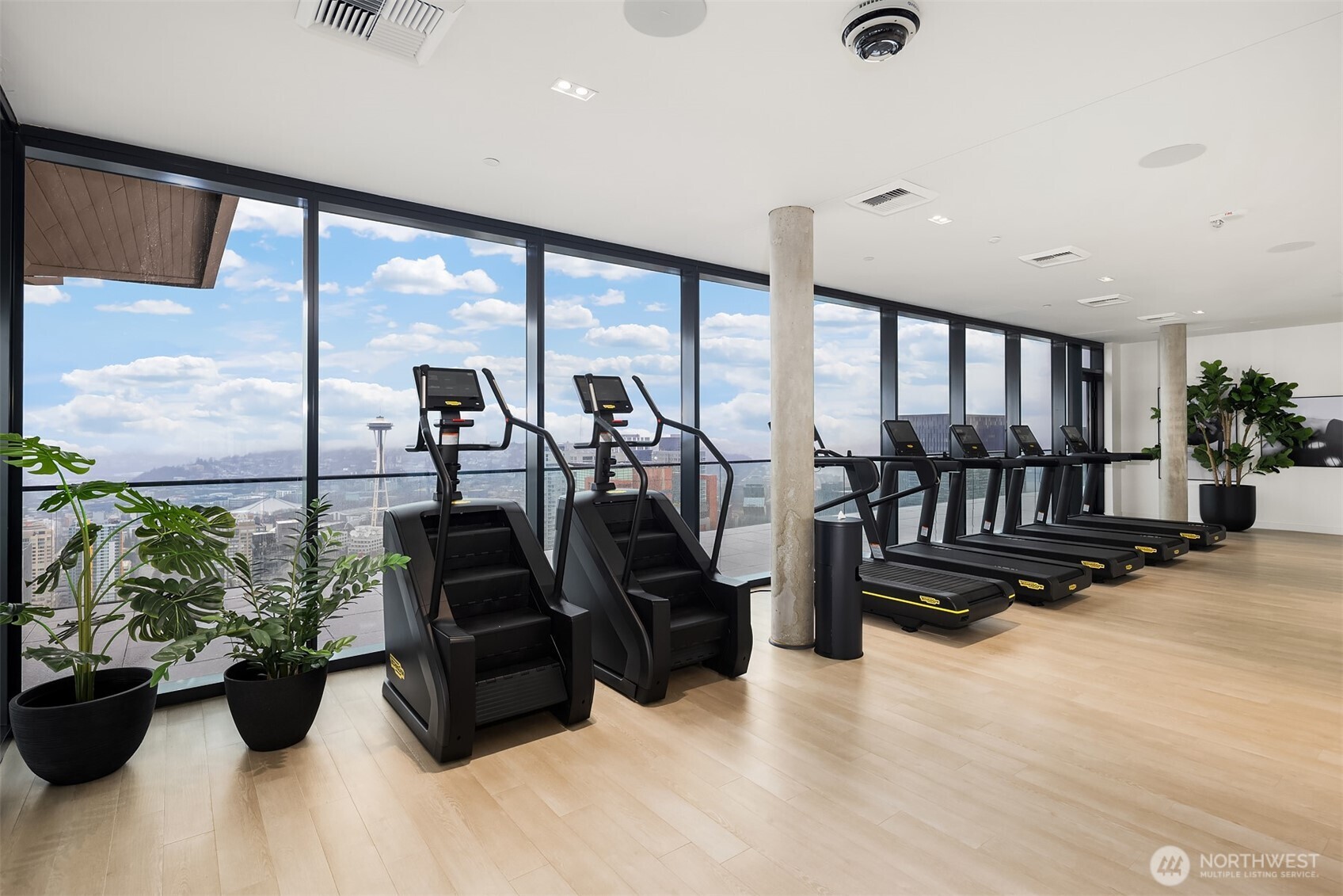 300 Virginia Street, Unit 3103 Seattle, WA 98101 - Photo 31 of 36 a view of a room with gym equipment