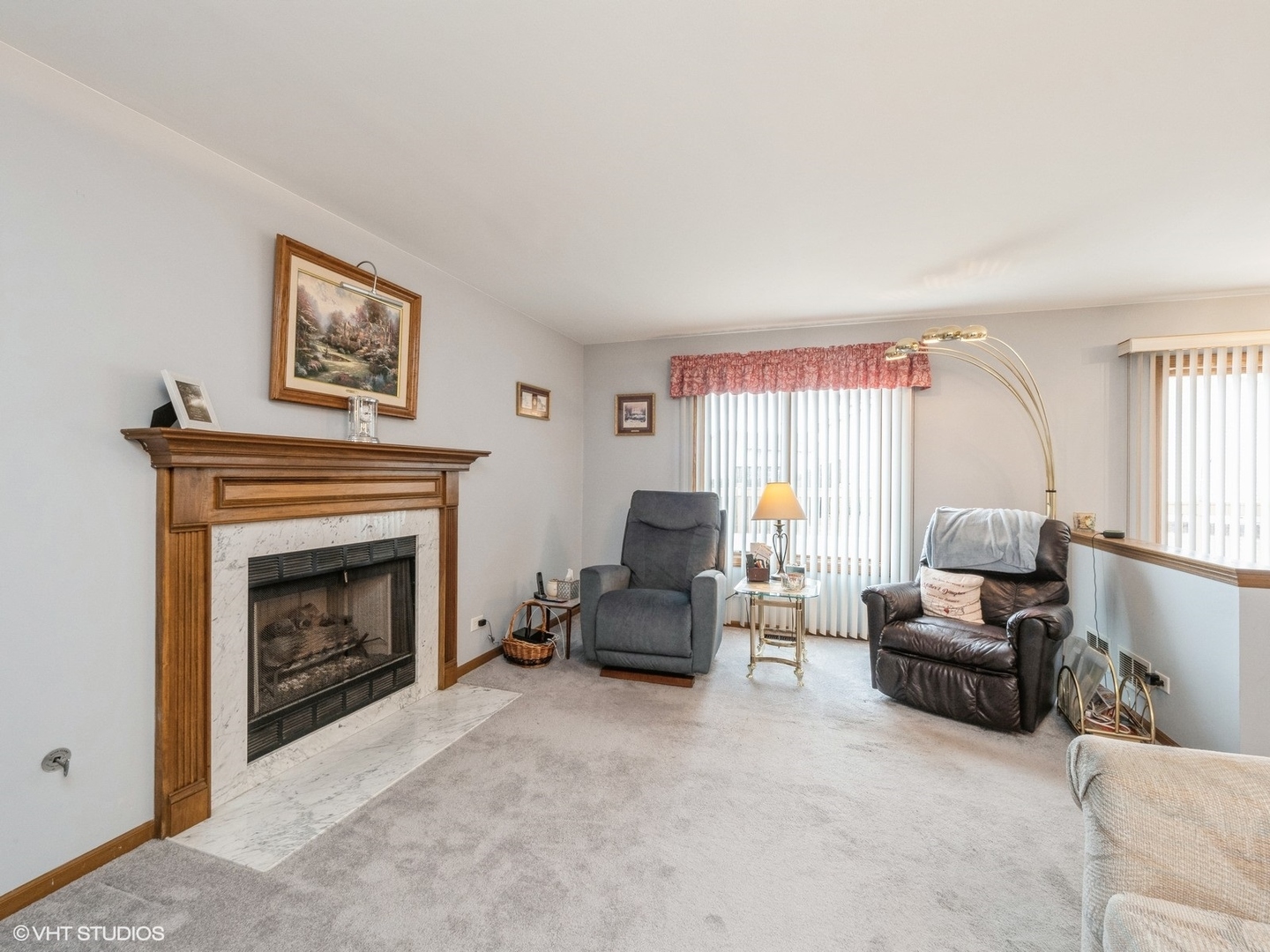 529 Adare Road Bartlett, IL 60103 - Photo 9 of 22 a living room with furniture and a fireplace