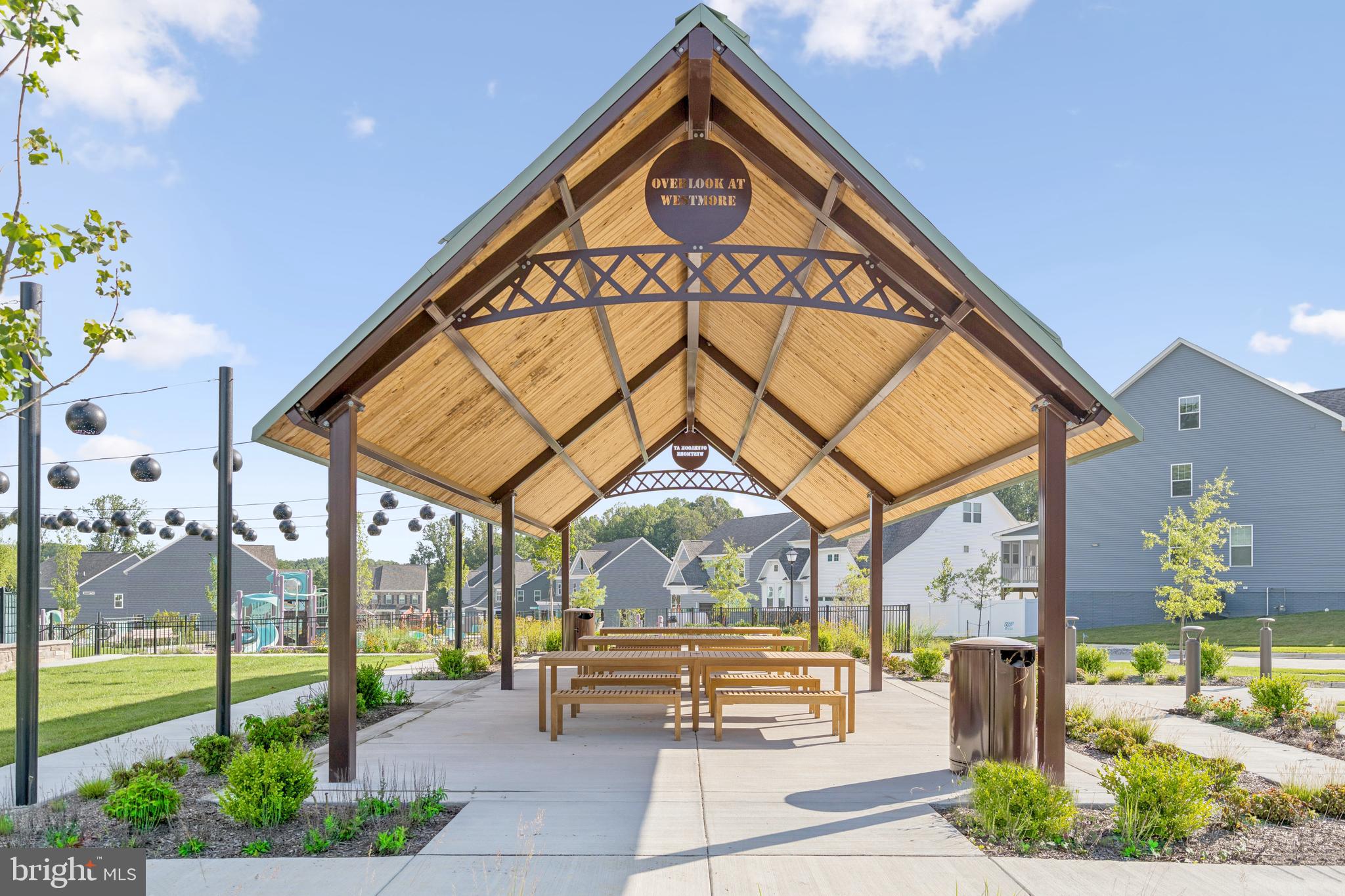 10933 Pinnacle Green Road Upper Marlboro, MD 20772 - Photo 23 of 29 a view of a building with a outdoor space and sitting space