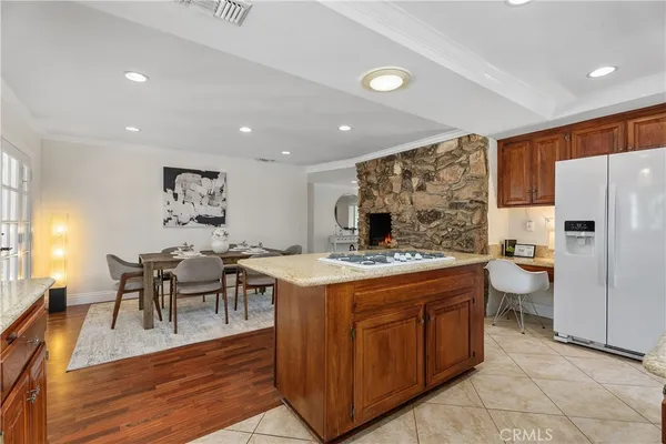 a kitchen with a table and chairs