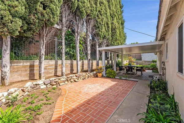 a view of a backyard with a garden