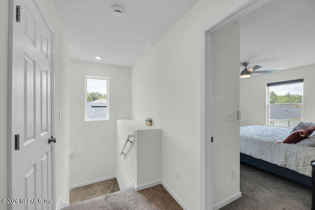 136 Peace River Road St. Johns, FL 32259 - Photo 16 of 40 a bedroom with a bed and a window