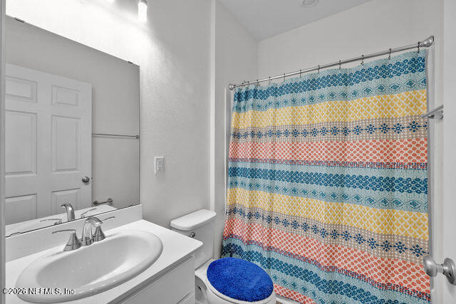 136 Peace River Road St. Johns, FL 32259 - Photo 23 of 40 a bathroom with a sink and a bathtub