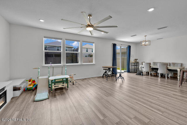 136 Peace River Road St. Johns, FL 32259 - Photo 35 of 40 a view of a dining room with furniture and wooden floor