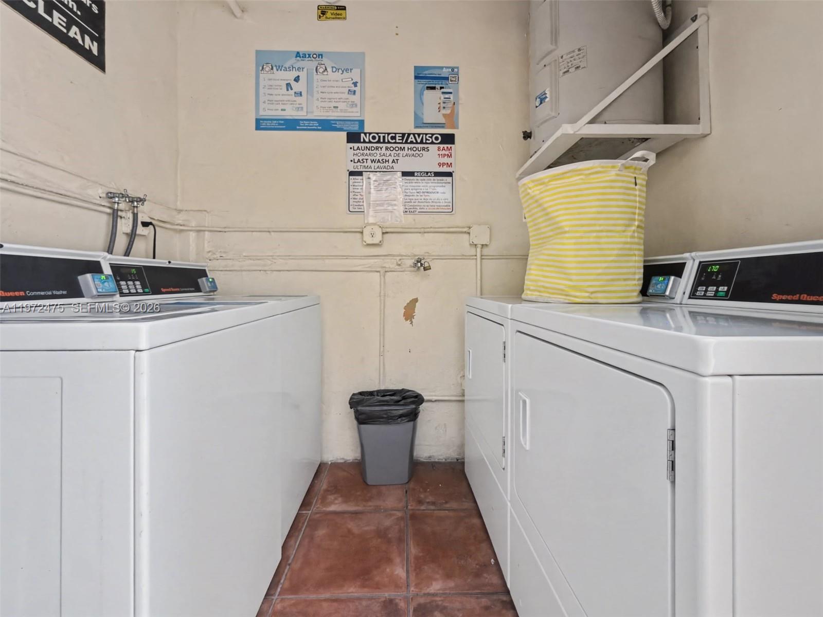 9417 Southwest 76th Street, Unit X36 Miami, FL 33173 - Photo 9 of 10 a utility room with dryer and washer