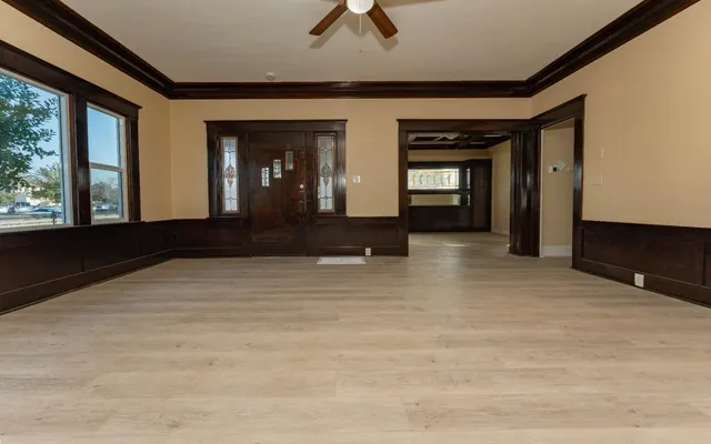 a view of an empty room with a window