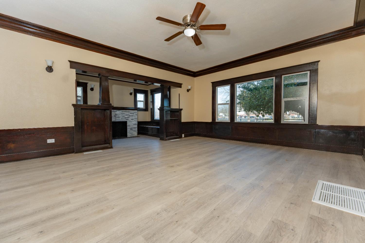 4354 East Kings Canyon Road Fresno, CA 93702 - Photo 16 of 70 a living room with furniture and a large window