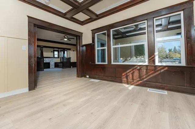 a view of a kitchen with granite countertop cabinets and window