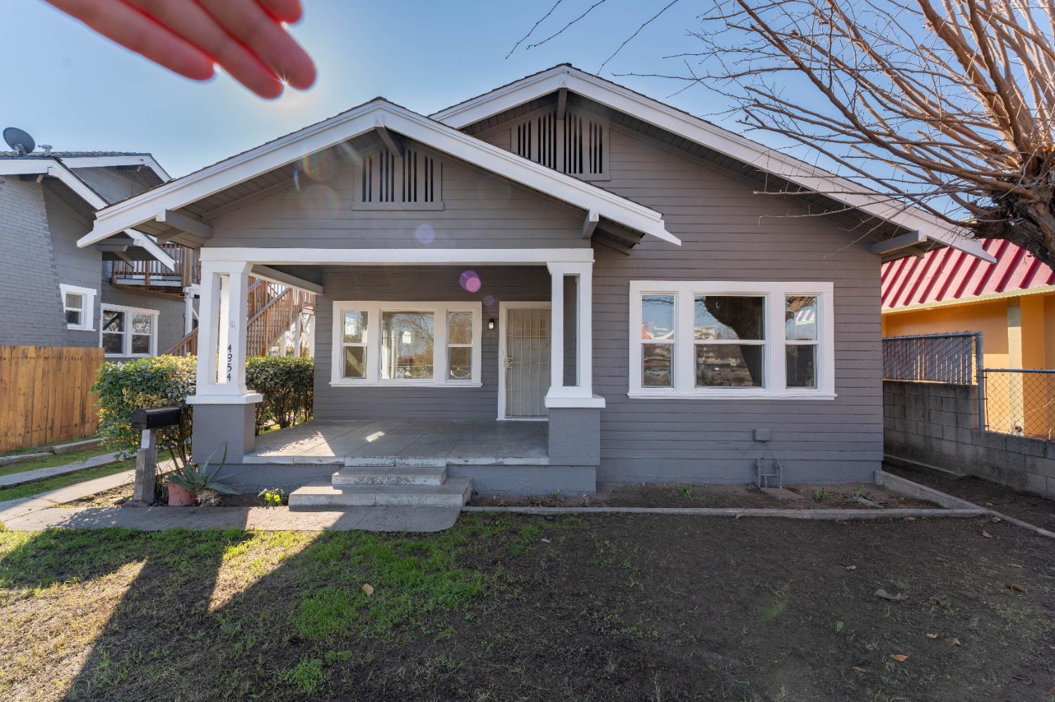 4354 East Kings Canyon Road Fresno, CA 93702 - Photo 49 of 70 a front view of a house with garden