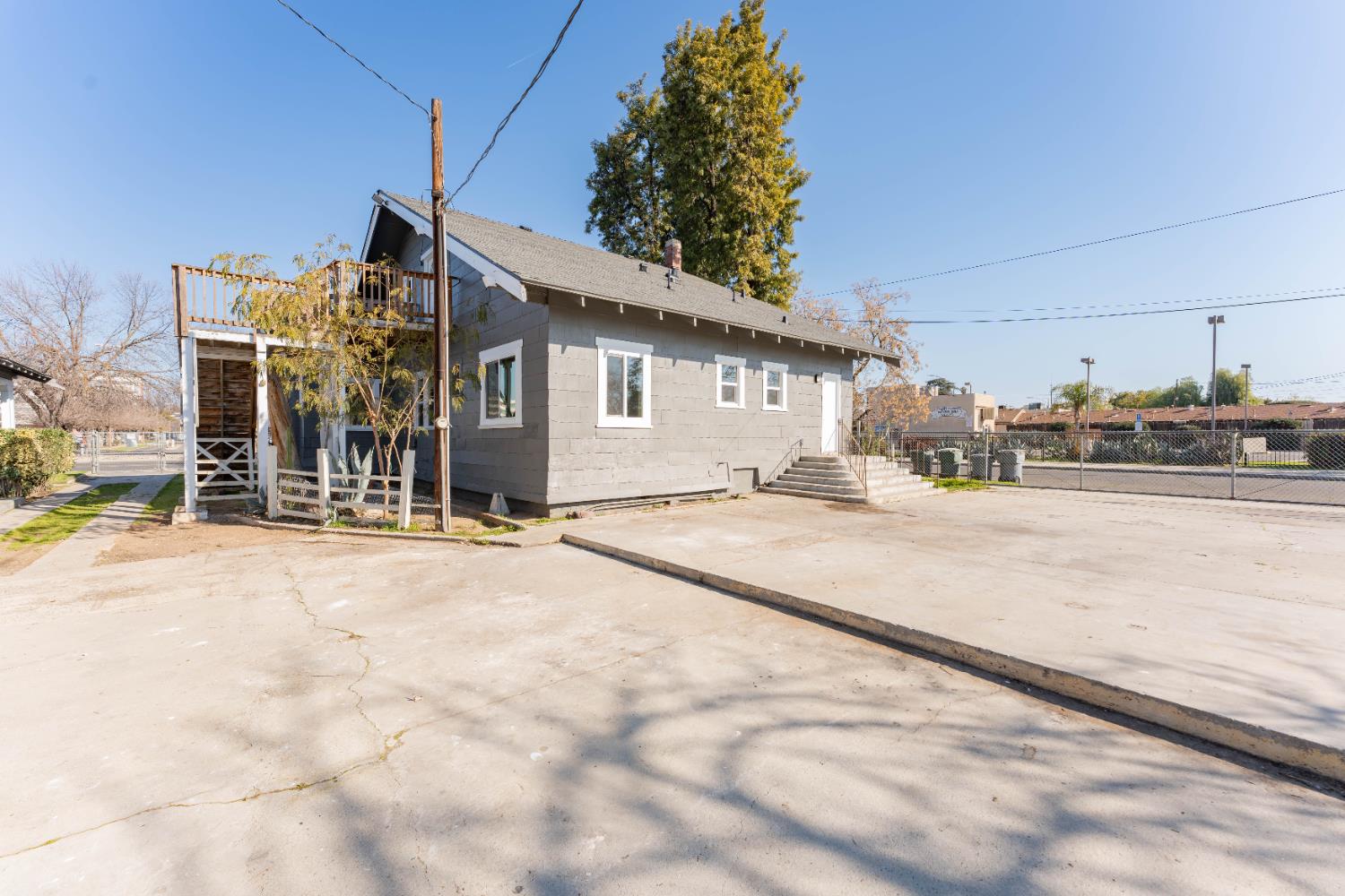 4354 East Kings Canyon Road Fresno, CA 93702 - Photo 5 of 70 a view of a house with a snow on the road