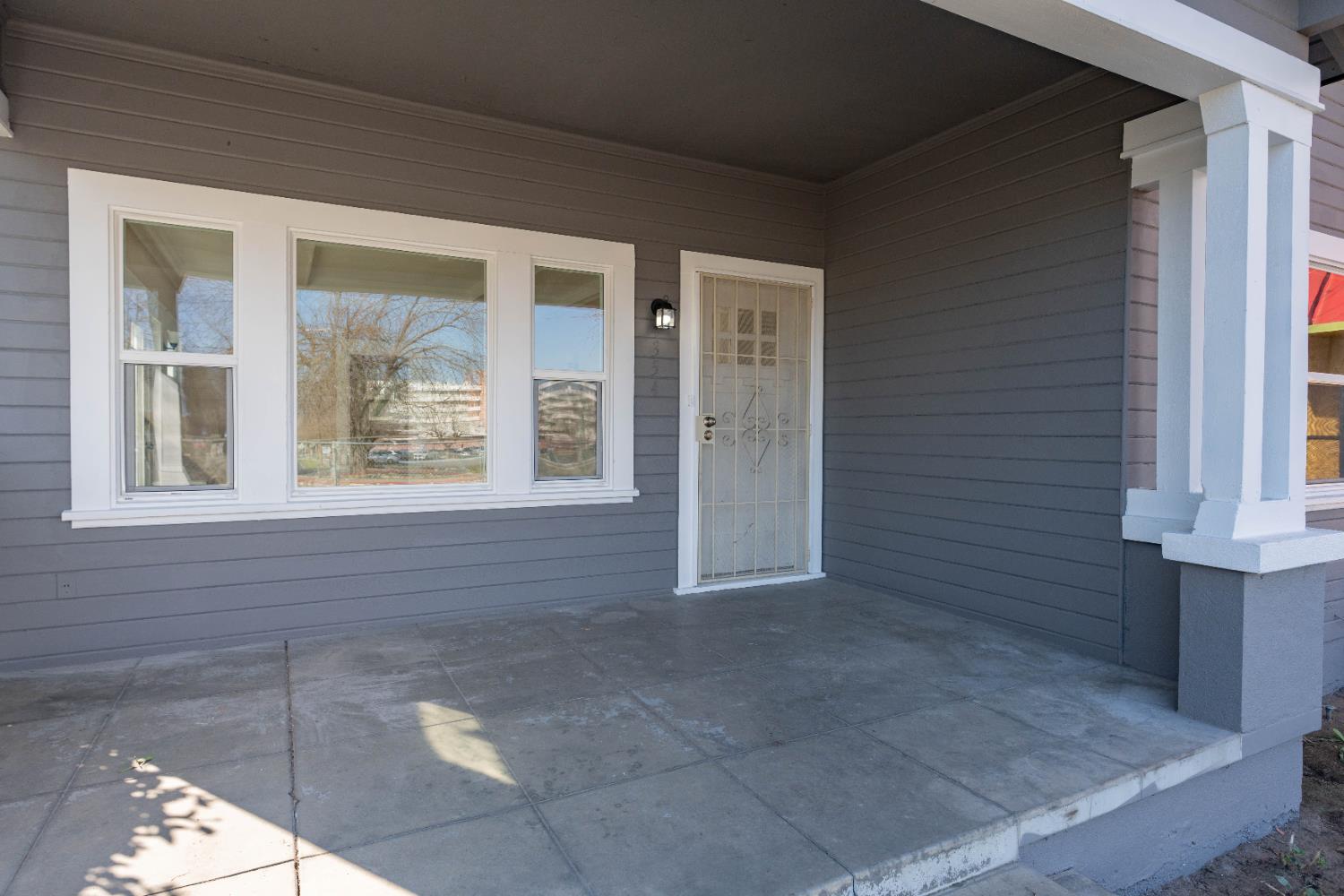 4354 East Kings Canyon Road Fresno, CA 93702 - Photo 51 of 70 a view of front door of house
