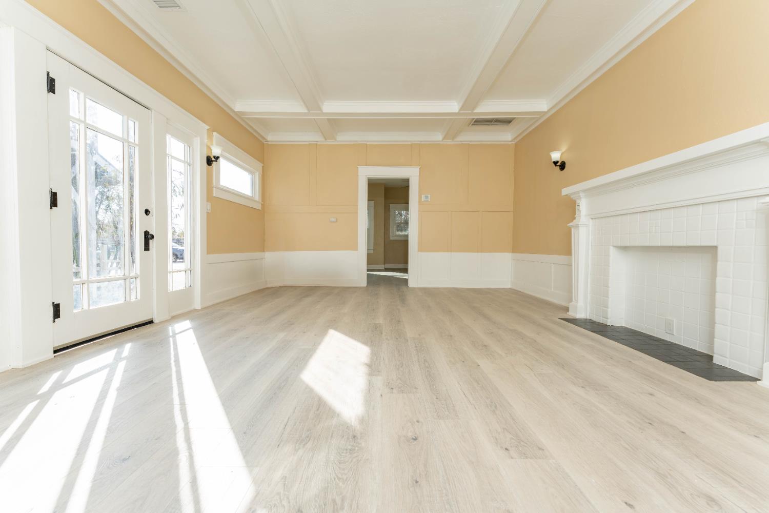 4354 East Kings Canyon Road Fresno, CA 93702 - Photo 54 of 70 a view of a big room with wooden floor and windows