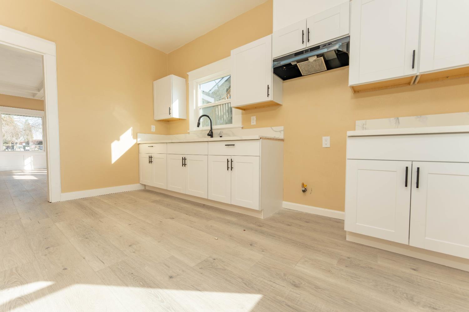 4354 East Kings Canyon Road Fresno, CA 93702 - Photo 61 of 70 a bathroom with a sink vanity and a mirror