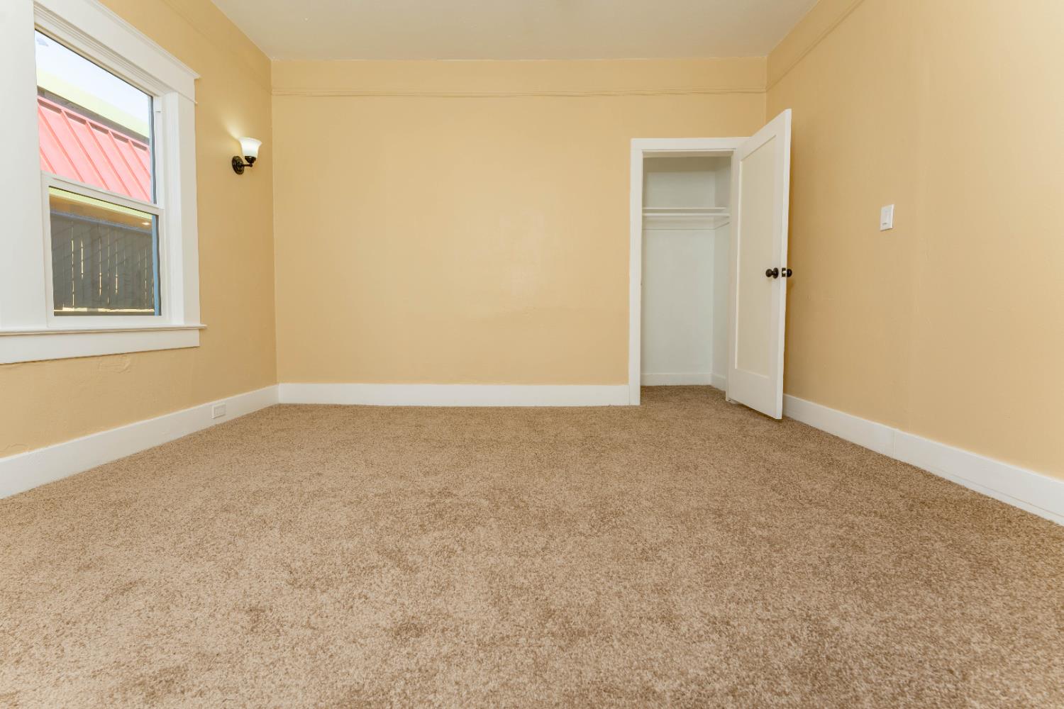 4354 East Kings Canyon Road Fresno, CA 93702 - Photo 63 of 70 an empty room with windows