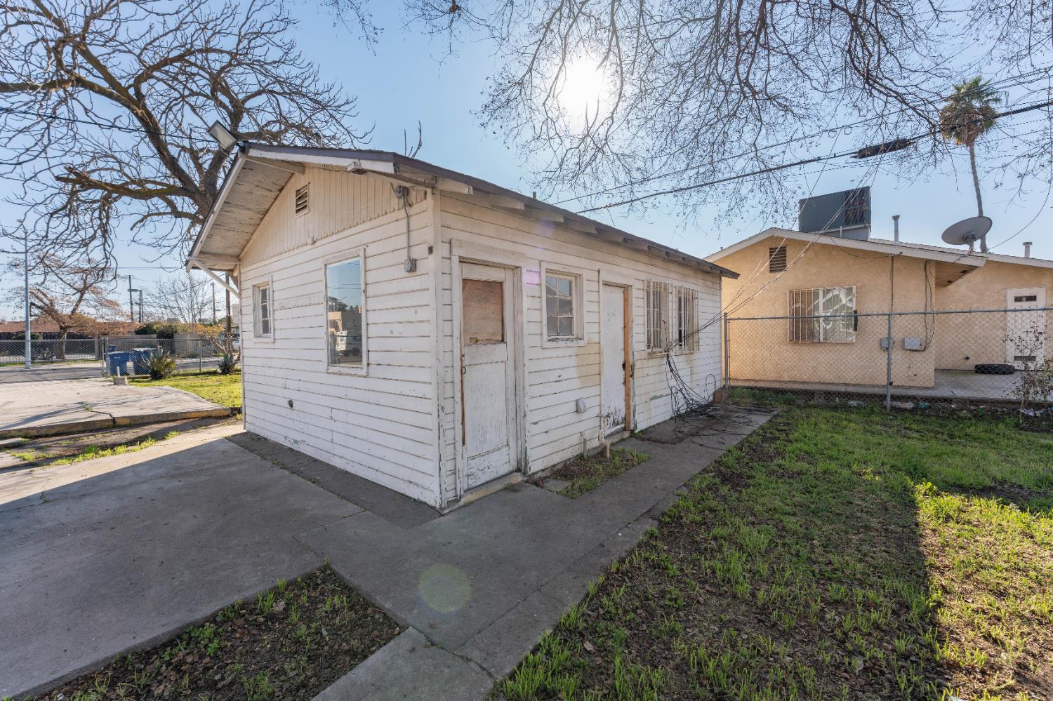 4354 East Kings Canyon Road Fresno, CA 93702 - Photo 7 of 70 a view of a house with a yard