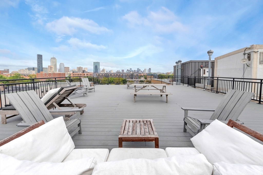 10 Williams Street, Unit 13 Boston, MA 02119 - Photo 35 of 38 a view of a terrace with chairs