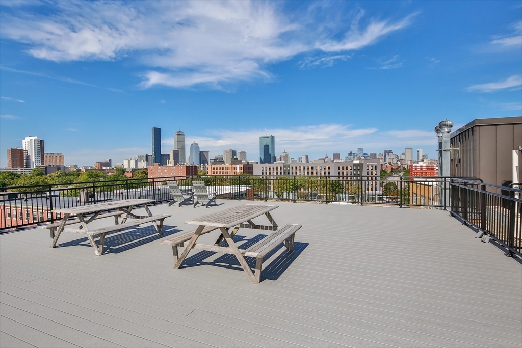 10 Williams Street, Unit 13 Boston, MA 02119 - Photo 36 of 38 a view of a terrace with city view