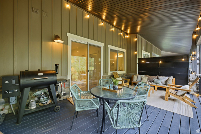 3355 Santa Fe Road Park City, UT 84098 - Photo 25 of 45 Expansive covered patio featuring a dark-stained deck, beadboard siding, and recessed lighting
