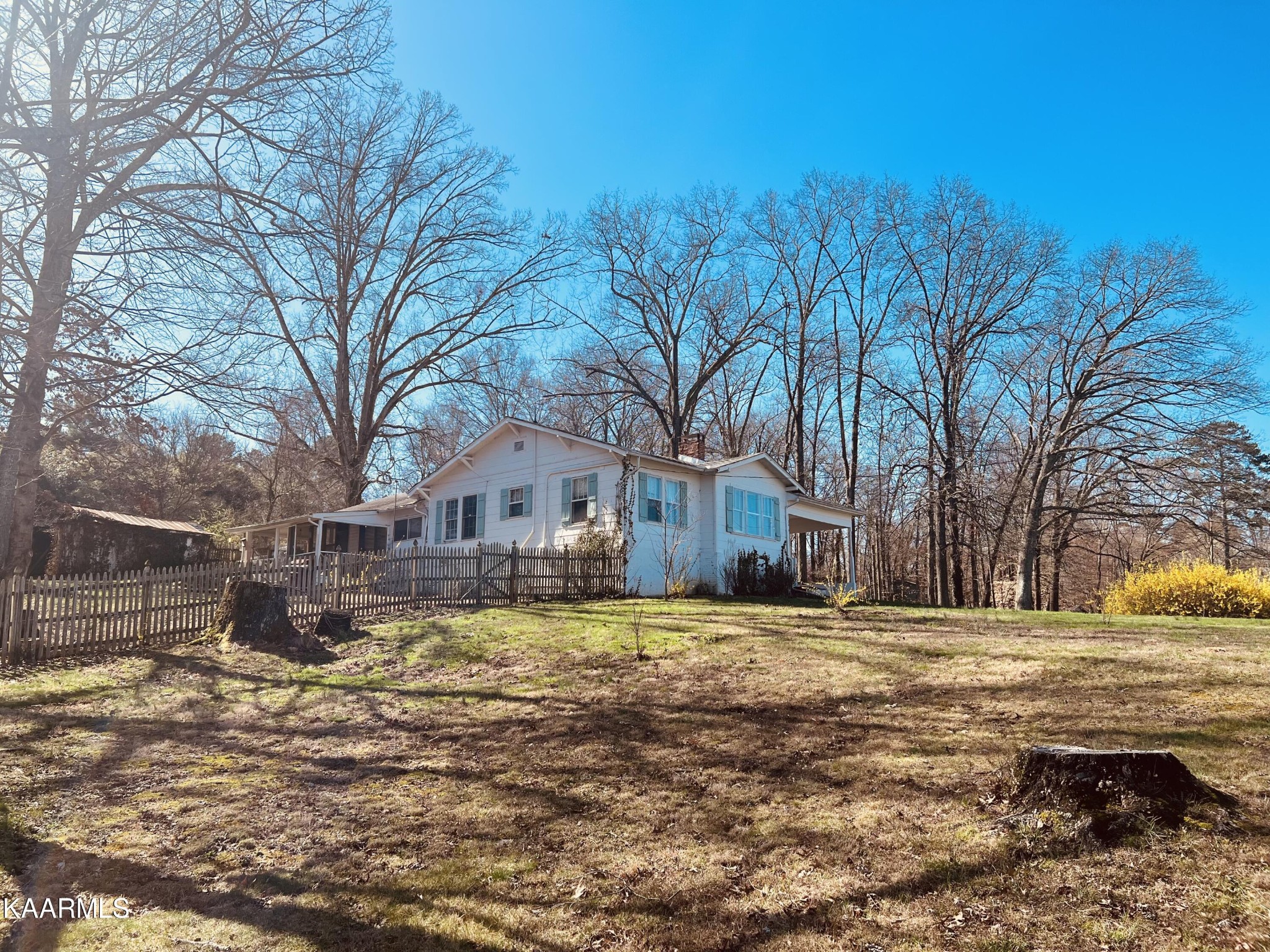 2108 Maple Drive Knoxville, TN 37918 - Photo 2 of 9 a tall house with a large tree in front of it