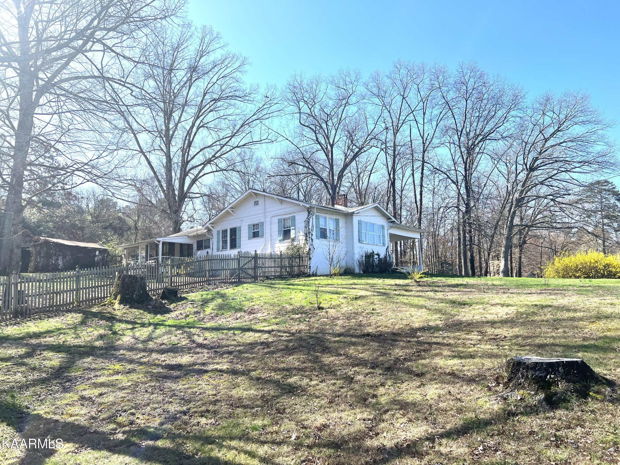 2108 Maple Drive Knoxville, TN 37918 - Photo 4 of 9 a view of a house with a yard covered in snow