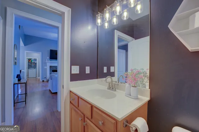 an empty room with potted plants and a potted plant