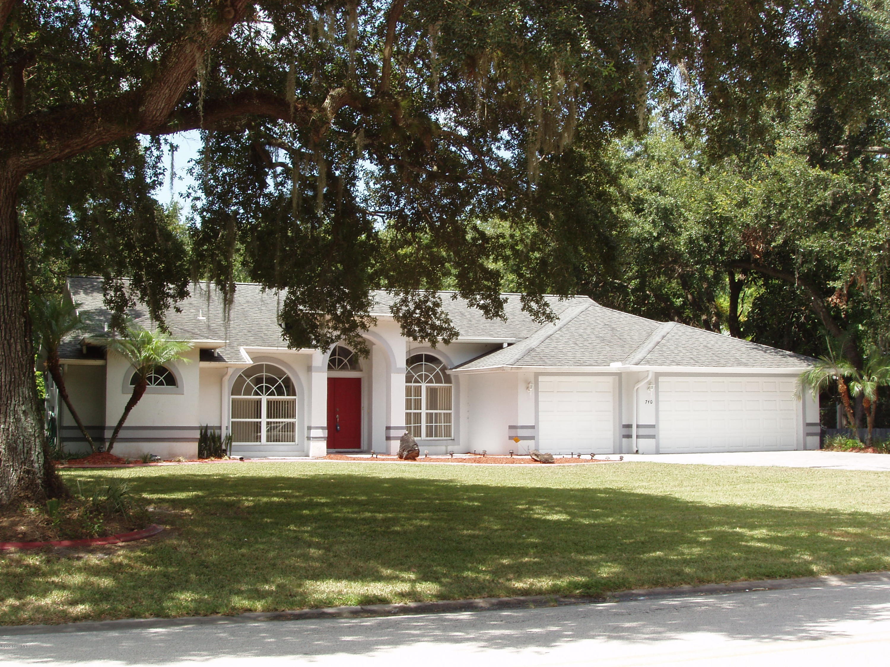 740 Riviera Drive Northeast Palm Bay, FL 32905 - Photo 1 of 30 Front of Home