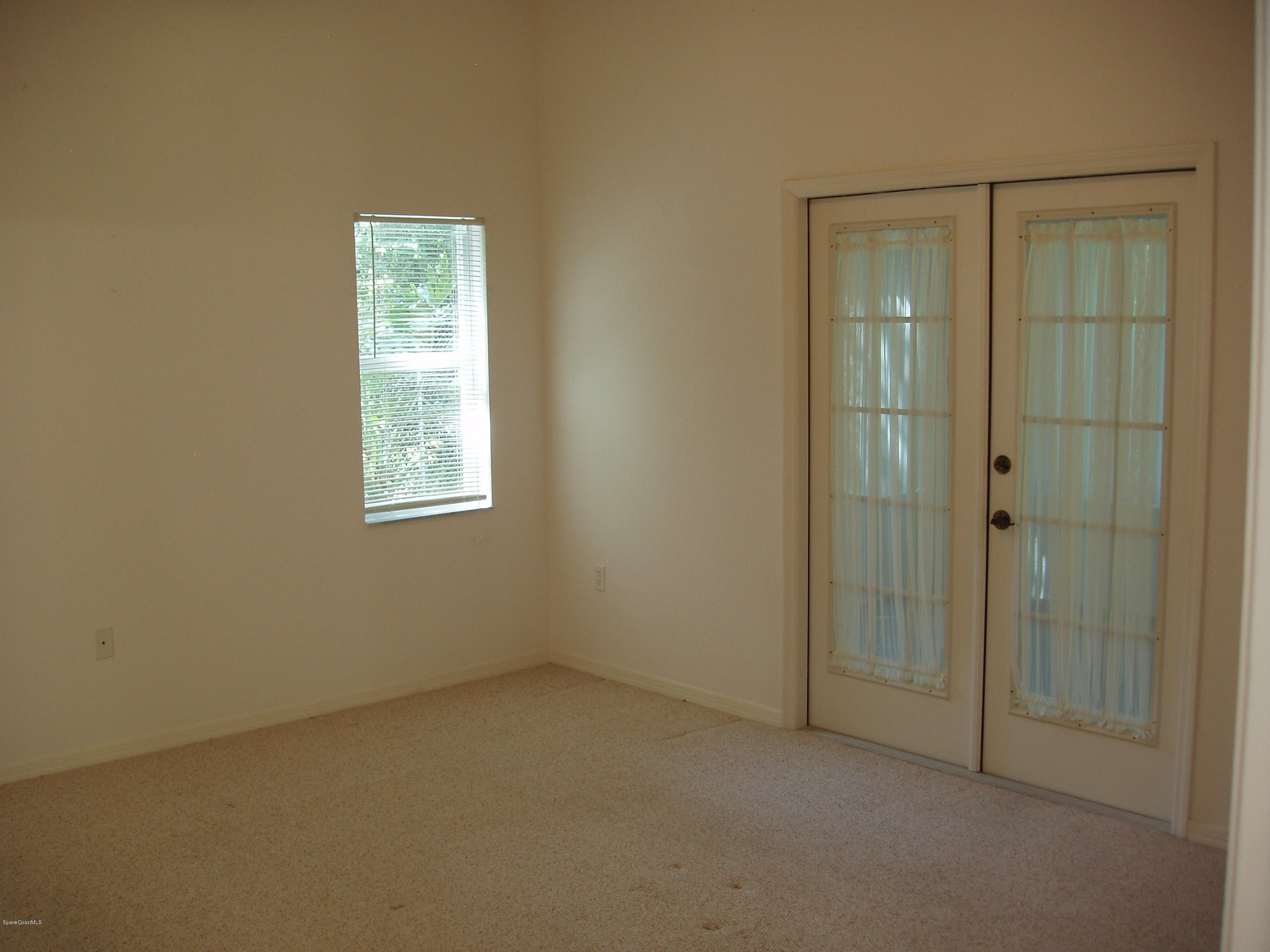 740 Riviera Drive Northeast Palm Bay, FL 32905 - Photo 14 of 30 Master Bedroom