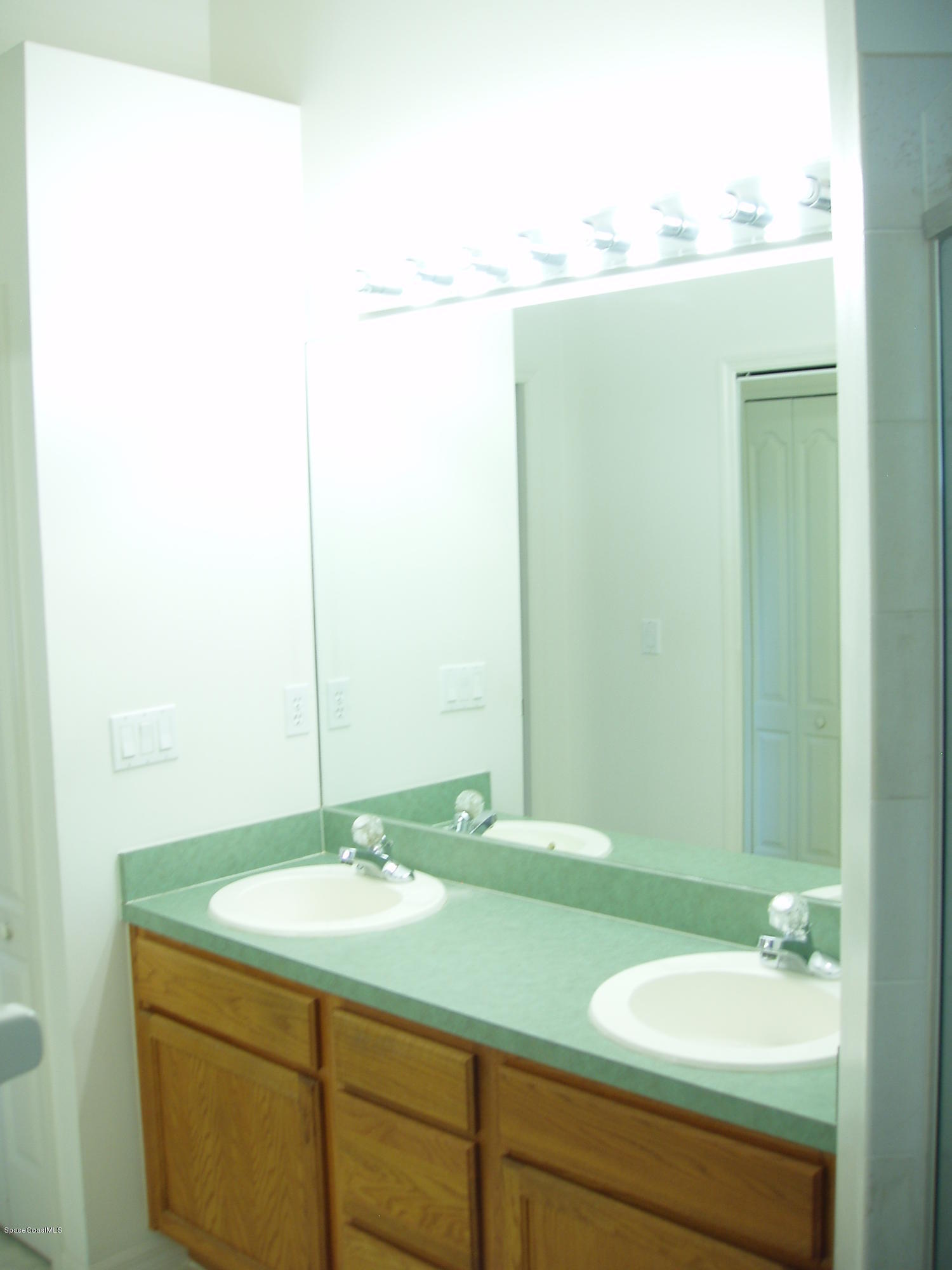740 Riviera Drive Northeast Palm Bay, FL 32905 - Photo 15 of 30 Master Bath Double Sinks